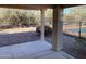 Covered patio overlooking backyard with pool at 1120 S 232Nd Ave, Buckeye, AZ 85326