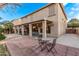 Home's backyard with patio and seating area at 11868 W Kinderman Dr, Avondale, AZ 85323