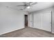 Bedroom with double door closet and carpet at 14428 W Faye Way, Surprise, AZ 85387