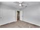Bright bedroom with double closets and carpet at 14428 W Faye Way, Surprise, AZ 85387