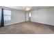 Bright bedroom with ceiling fan and window coverings at 14428 W Faye Way, Surprise, AZ 85387