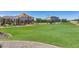 Park with playground, shaded seating, and grassy area at 14428 W Faye Way, Surprise, AZ 85387