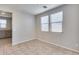 Bright dining area with tile floors and neutral walls at 14428 W Faye Way, Surprise, AZ 85387
