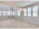 Dining room featuring tile floors and chandelier at 14428 W Faye Way, Surprise, AZ 85387