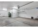 Bright and spacious garage with overhead storage at 14428 W Faye Way, Surprise, AZ 85387