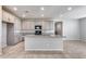 Modern kitchen with gray cabinets and granite island at 14428 W Faye Way, Surprise, AZ 85387