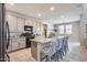 Spacious kitchen with granite countertops and island at 14428 W Faye Way, Surprise, AZ 85387