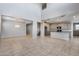 Open concept kitchen with island and high ceilings at 14428 W Faye Way, Surprise, AZ 85387