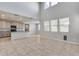 Modern kitchen with gray cabinets and granite counters at 14428 W Faye Way, Surprise, AZ 85387