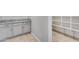 Walk-in pantry with ample shelving for storage at 14428 W Faye Way, Surprise, AZ 85387