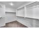 Spacious walk-in closet with double rods and shelving at 14428 W Faye Way, Surprise, AZ 85387