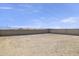 Empty lot perfect for creating a beautiful outdoor space at 1615 S 239Th Dr, Buckeye, AZ 85326
