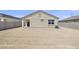 Large backyard with block wall and space for landscaping at 1615 S 239Th Dr, Buckeye, AZ 85326