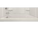 Bathroom with shower and bathtub at 1615 S 239Th Dr, Buckeye, AZ 85326