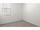 Simple bedroom with carpet and window at 1615 S 239Th Dr, Buckeye, AZ 85326
