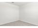 Empty bedroom with neutral walls and carpet at 1615 S 239Th Dr, Buckeye, AZ 85326