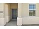 Modern front door entry to a new construction home at 1615 S 239Th Dr, Buckeye, AZ 85326