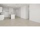 Open concept kitchen with island, white cabinets and stainless steel appliances at 1615 S 239Th Dr, Buckeye, AZ 85326