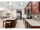 Spacious kitchen with granite countertops and modern appliances at 16711 S 178Th Dr, Goodyear, AZ 85338