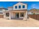 Two-story house with a covered patio and large backyard at 1702 W Flintlock Dr, San Tan Valley, AZ 85144