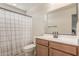 Clean bathroom with vanity, toilet and shower at 1702 W Flintlock Dr, San Tan Valley, AZ 85144