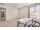 Bright bedroom with home office and bath access at 1702 W Flintlock Dr, San Tan Valley, AZ 85144