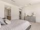 Main bedroom with dresser and access to hallway and upstairs at 1702 W Flintlock Dr, San Tan Valley, AZ 85144
