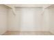 Large walk-in closet with double hanging rods at 1702 W Flintlock Dr, San Tan Valley, AZ 85144