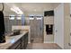 Spacious bathroom with granite countertops, double sinks, and a large shower at 1713 E Amaranth Trl, Queen Creek, AZ 85140