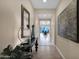 Spacious entryway showcasing a large art piece and view into the living area at 1713 E Amaranth Trl, Queen Creek, AZ 85140