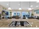 Modern kitchen island with granite countertop and gas cooktop at 1713 E Amaranth Trl, Queen Creek, AZ 85140
