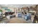 Open concept kitchen with an island, ample cabinetry, and dining area at 1713 E Amaranth Trl, Queen Creek, AZ 85140