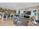 Modern kitchen featuring an island, stainless steel appliances, and breakfast bar at 1713 E Amaranth Trl, Queen Creek, AZ 85140