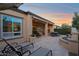 Extended patio with seating, dining and water feature at 1713 E Amaranth Trl, Queen Creek, AZ 85140