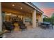 Relaxing patio with comfortable seating and views of the kitchen at 1713 E Amaranth Trl, Queen Creek, AZ 85140