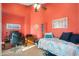 Cozy bedroom with a daybed and home office space at 18431 N Coconino Dr, Surprise, AZ 85374