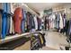Large walk-in closet with ample hanging space and shelving at 18431 N Coconino Dr, Surprise, AZ 85374