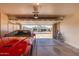 Garage with car, bikes, and storage cabinets at 18431 N Coconino Dr, Surprise, AZ 85374