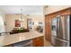 Spacious kitchen with stainless steel appliances and island at 18431 N Coconino Dr, Surprise, AZ 85374