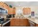 Well-equipped kitchen with stainless steel appliances and double sink at 18431 N Coconino Dr, Surprise, AZ 85374