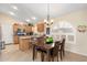 Bright kitchen with stainless steel appliances and an island at 18431 N Coconino Dr, Surprise, AZ 85374