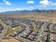 Aerial view of the community and surrounding mountain views at 18956 W Laurel Ln, Surprise, AZ 85388