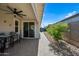 Covered patio with ceiling fan and outdoor seating at 18956 W Laurel Ln, Surprise, AZ 85388