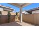 Exterior view showcasing backyard patio and landscaping at 20316 W Turney Ave, Buckeye, AZ 85396