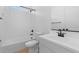 Modern bathroom featuring a sleek vanity, toilet, and tiled shower with modern fixtures at 20316 W Turney Ave, Buckeye, AZ 85396