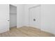 This charming bedroom features tile floors and a spacious closet at 20316 W Turney Ave, Buckeye, AZ 85396
