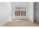 Cozy bedroom featuring tile floors, natural light, and a convenient closet at 20316 W Turney Ave, Buckeye, AZ 85396