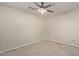 Spacious bedroom with ceiling fan and carpet at 21391 E Camina Plata --, Queen Creek, AZ 85142