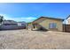 Backyard view of house and patio at 2201 N 91St Gln, Phoenix, AZ 85037