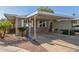 Home exterior with carport and desert landscaping at 2233 E Behrend Dr # 234, Phoenix, AZ 85024